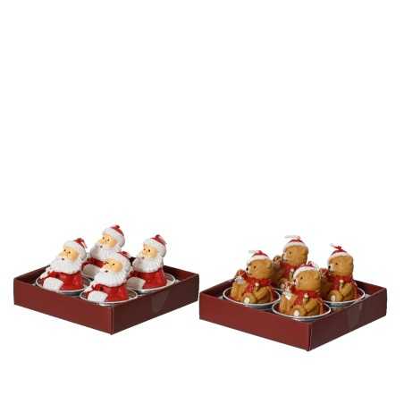 Pâtisseries festives en forme de bonhommes de Noël, colorées et joyeusement décorées.