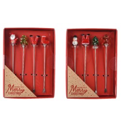 Stylos festifs en métal avec décorations de Noël colorées dans une boîte rouge.