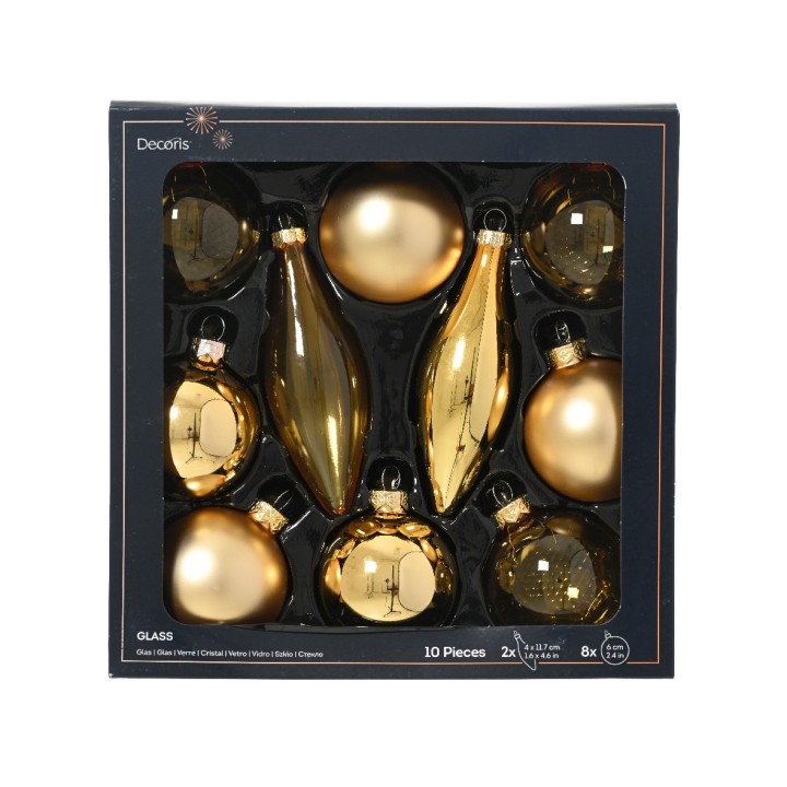 Boîte noire contenant dix ornements de Noël dorés aux formes variées et brillantes.