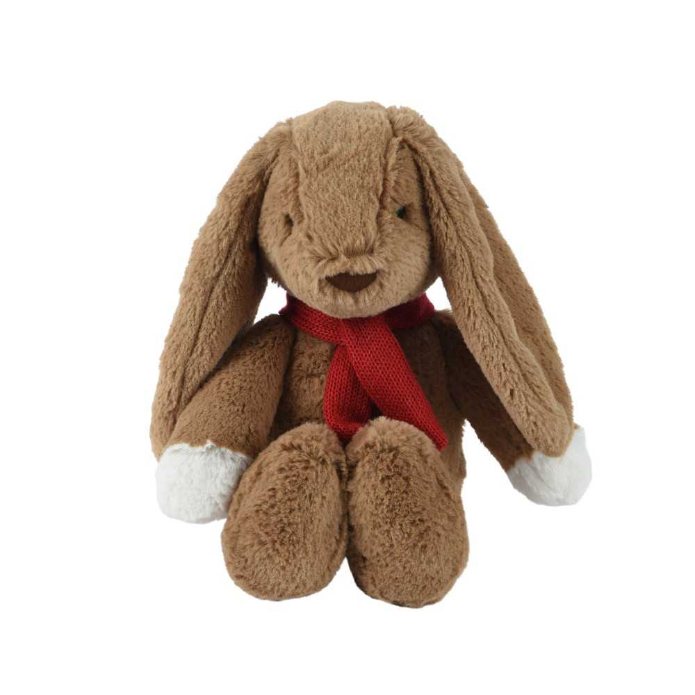 Lapin en peluche marron avec écharpe rouge, oreilles longues et pattes blanches.