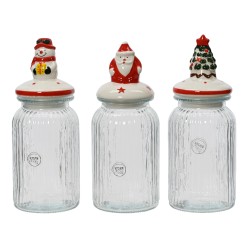 Trois bocaux en verre avec des couvercles décorés de Noël : bonhomme de neige, père Noël, sa...
