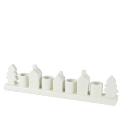Candelabre en céramique blanche, forme de maisons et sapins stylisés.