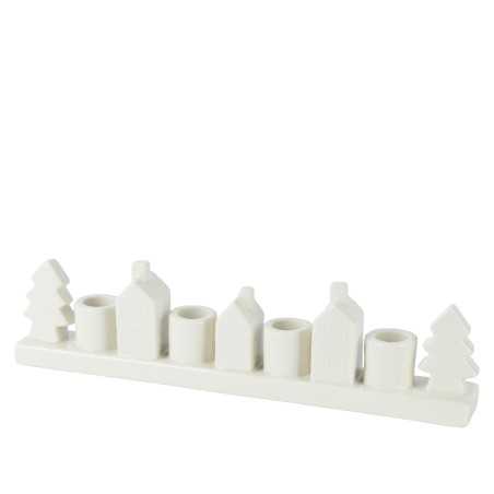 Candelabre en céramique blanche, forme de maisons et sapins stylisés.