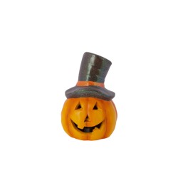 Citrouille souriante avec chapeau haut de forme, couleurs vives et expression joyeuse.