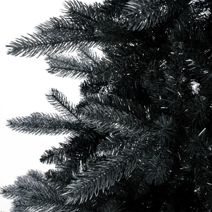 Branches noires d'un sapin artificiel sur fond blanc, aspect élégant et moderne.