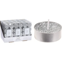 Bougies argentées scintillantes, pack élégant, ambiance festive et chaleureuse.