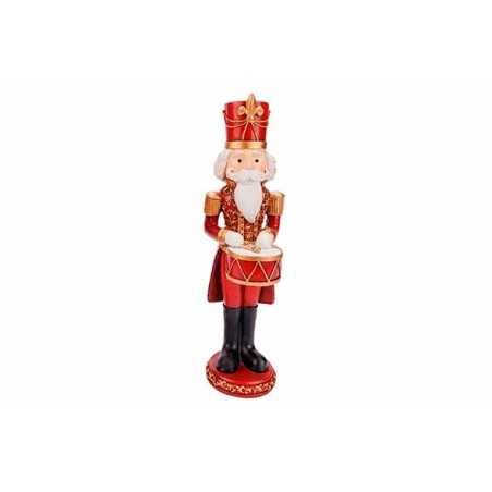 Figurine de soldat en bois, rouge et doré, tenant un tambour, festive et traditionnelle. Figurine de soldat en bois, rouge et doré, tenant un tambour, festive et traditionnelle.
