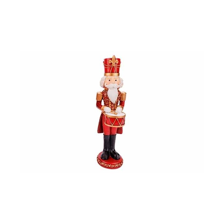 Figurine de soldat en bois, rouge et doré, tenant un tambour, festive et traditionnelle.