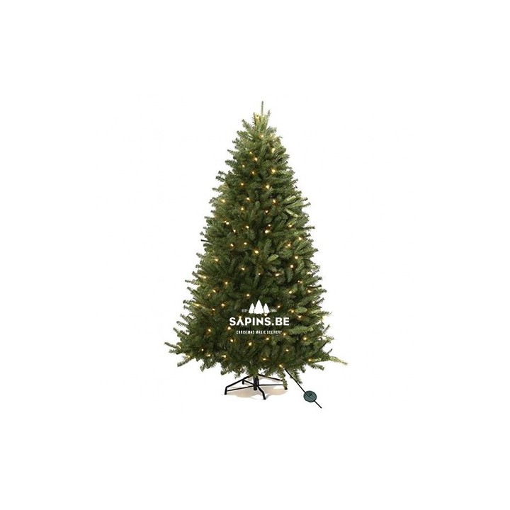 Sapin de Noël artificiel vert, décoré de lumières blanches, sur un support noir.