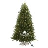 Sapins artificiel vert, décoré de lumières chaudes, sur un support en métal. Sapins artificiel vert, décoré de lumières chaudes, sur un support en métal.