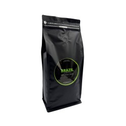 Sachet noir élégant de café avec étiquette verte, style moderne et design épuré.