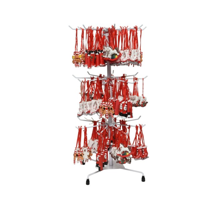 Support de présentation circulaire avec de nombreux vêtements rouges et motifs festifs.