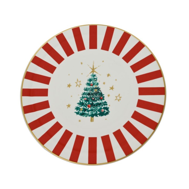 Assiette blanche décorée de rayures rouges et d'un sapin de Noël doré.
