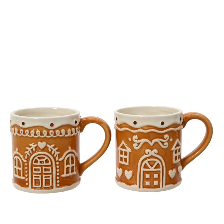 Tasses en céramique marron décorées de motifs de maison en relief et de cœurs.