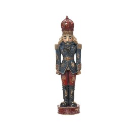 Figurine colorée de soldat en bois, ornée de dorures, coiffée d'un chapeau royal.