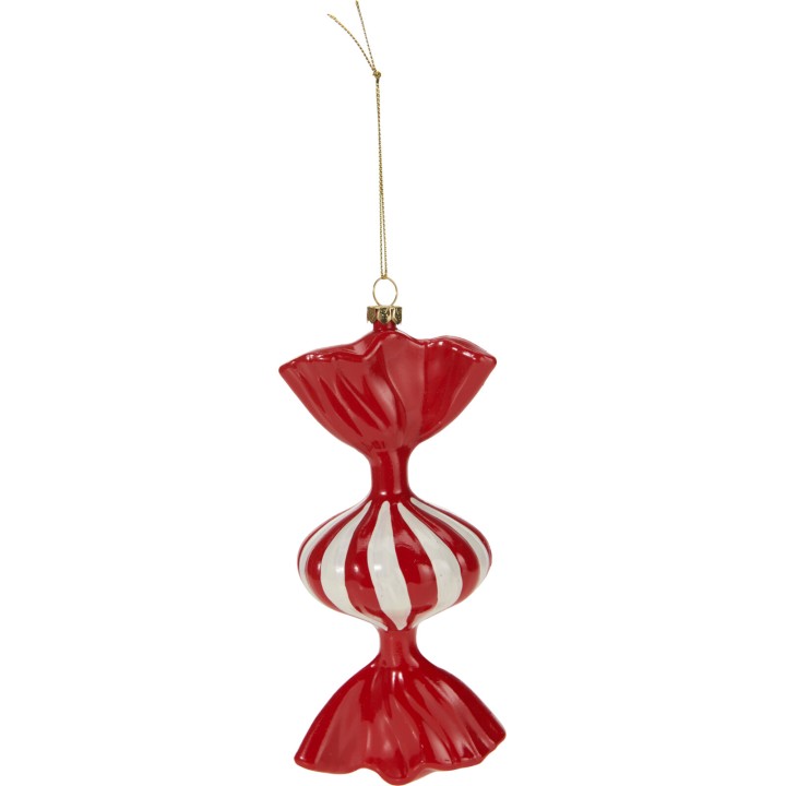 Ornement en verre en forme de bonbon rouge et blanc, brillant et festif.