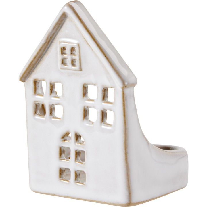 Objet en céramique blanc en forme de maison, fenêtres ajourées et finition lisse.