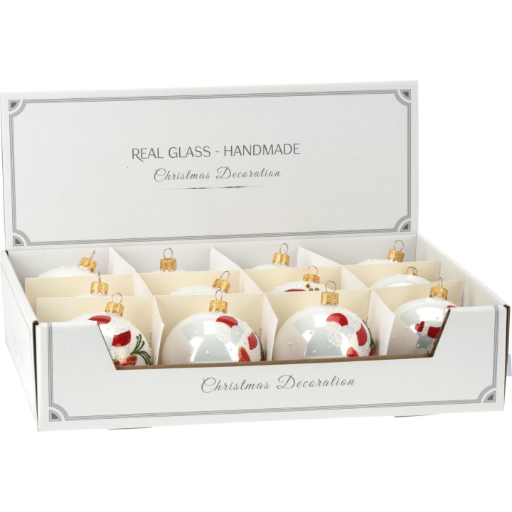 Douze boules en verre décorées de motifs festifs, présentées dans une élégante boîte blanche.