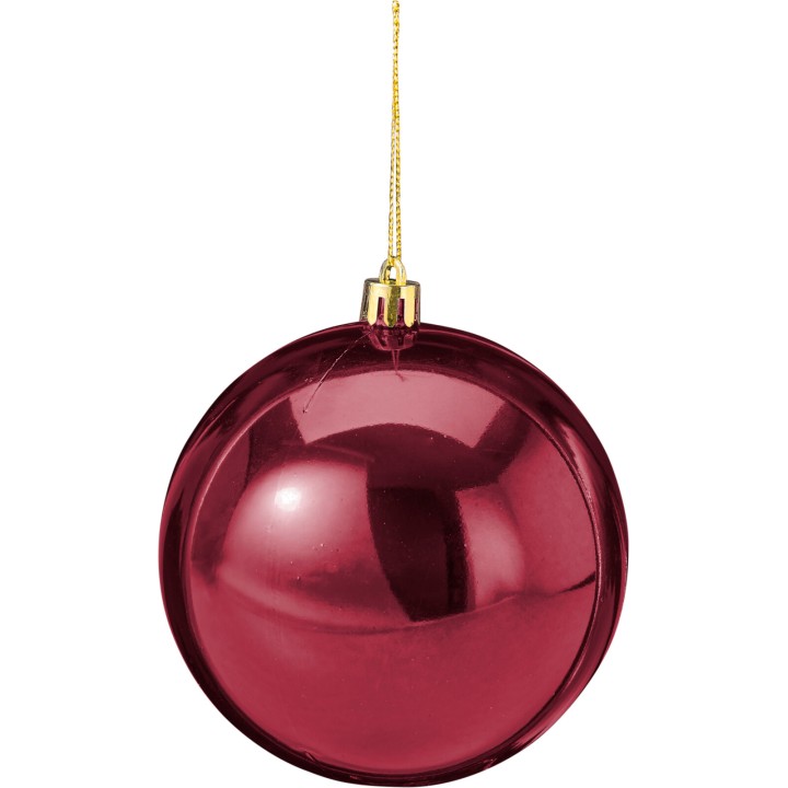 Boule de Noël rouge brillante suspendue, reflet doré et surface lisse.
