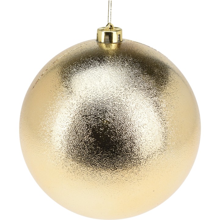Boule dorée brillante et lisse, suspendue par un fil fin, reflet lumineux.