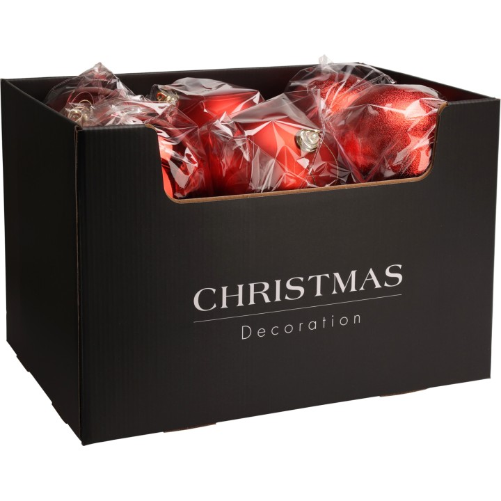 Boîte noire contenant des boules de Noël rouges, soigneusement emballées.
