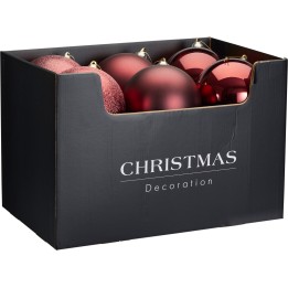 Boîte noire contenant des boules de Noël rouges brillantes et scintillantes.