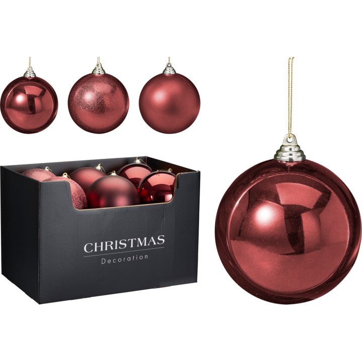 Boules de Noël rouge brillant dans une boîte noire élégante.