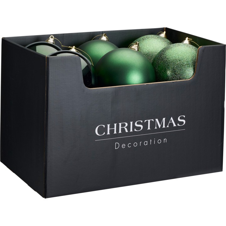 Boîte noire contenant des boules de Noël vertes, brillantes et texturées.