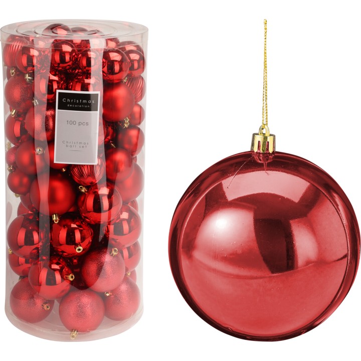 Boules de Noël rouges brillantes, emballées dans un tube transparent, festive et élégante.