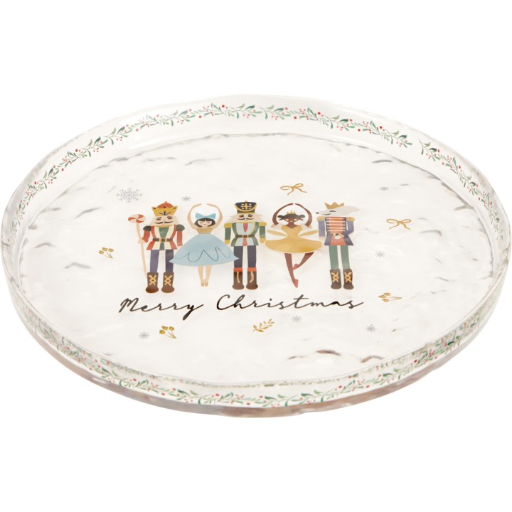 Assiette ronde transparente décorée de figurines de Noël et d'inscriptions festives.