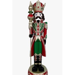 Figurine du roi en bois, ornée de rouge et vert, avec couronne et sceptre doré.