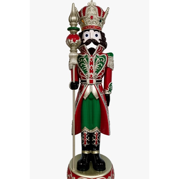 Figurine du roi en bois, ornée de rouge et vert, avec couronne et sceptre doré.