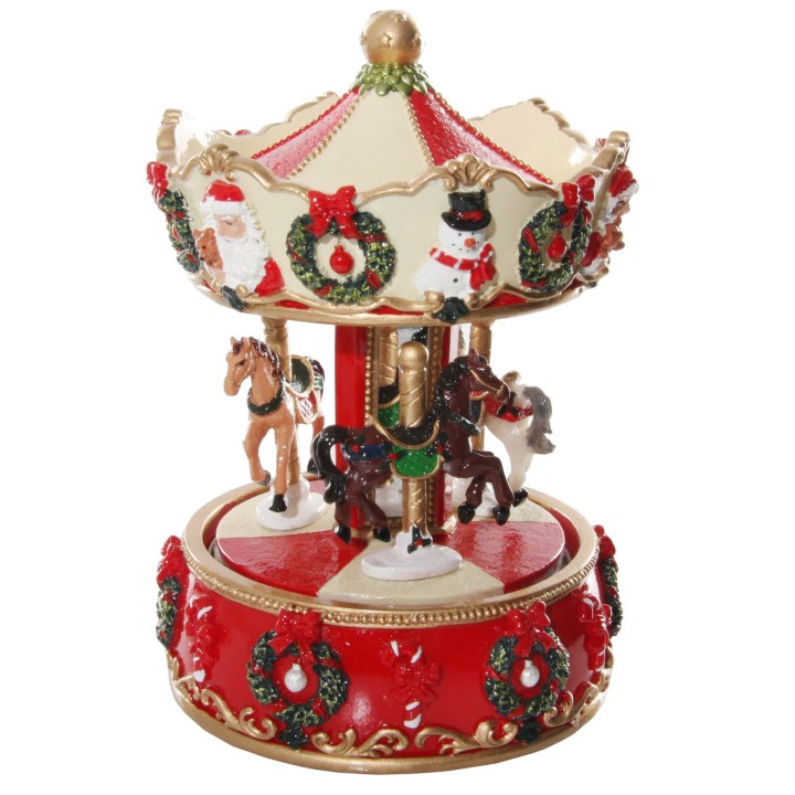 Carrousel festif orné de motifs de Noël, avec chevaux miniatures et couleurs vives.