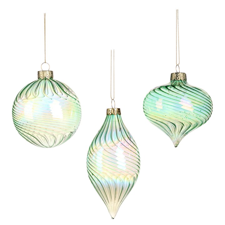 Boules de Noël en verre irisé, aux teintes vertes et formes élégantes.